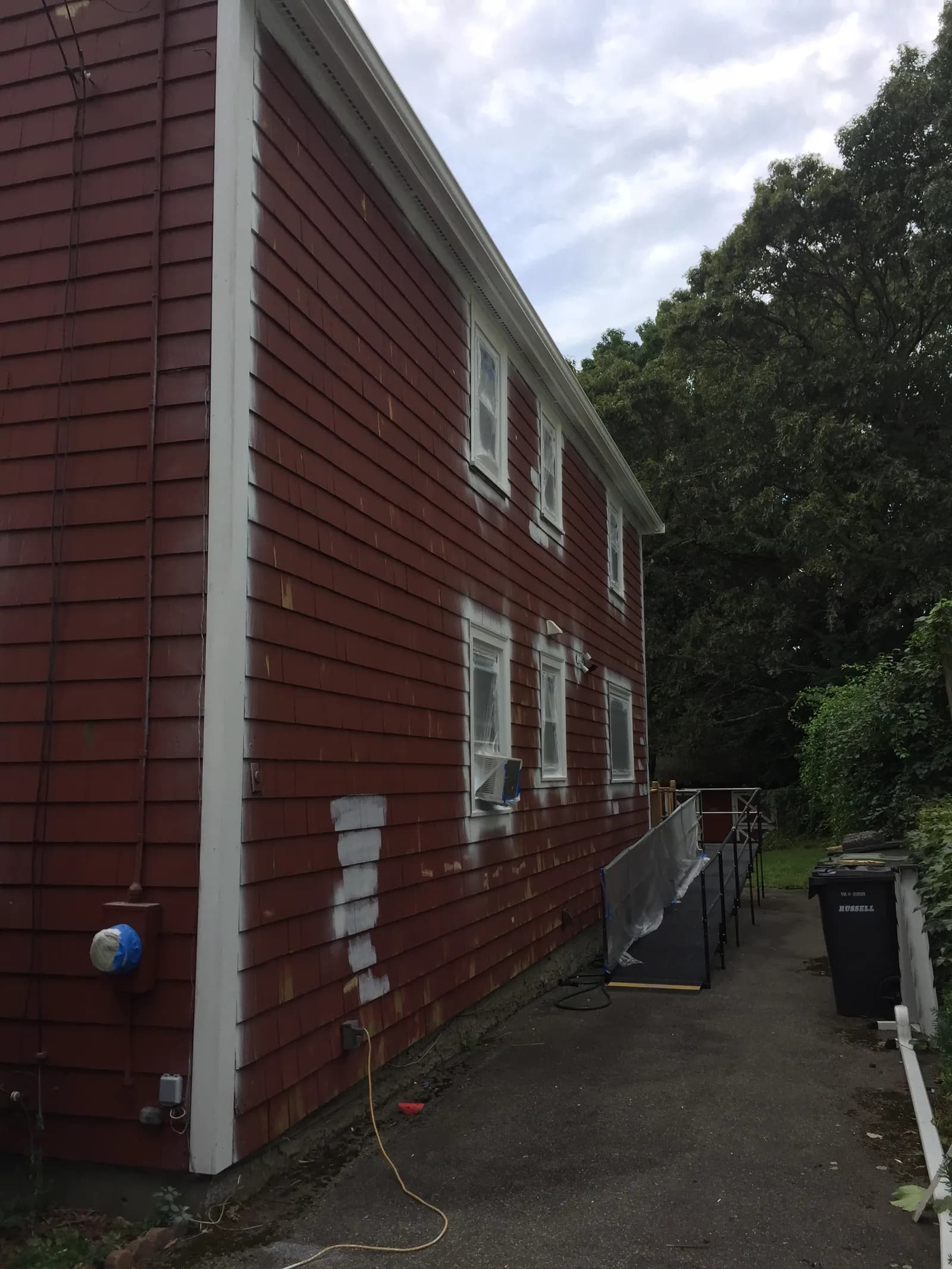 Cape-style home exterior repaint – before